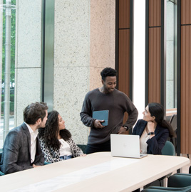 a group of employees having a fun productive meeting